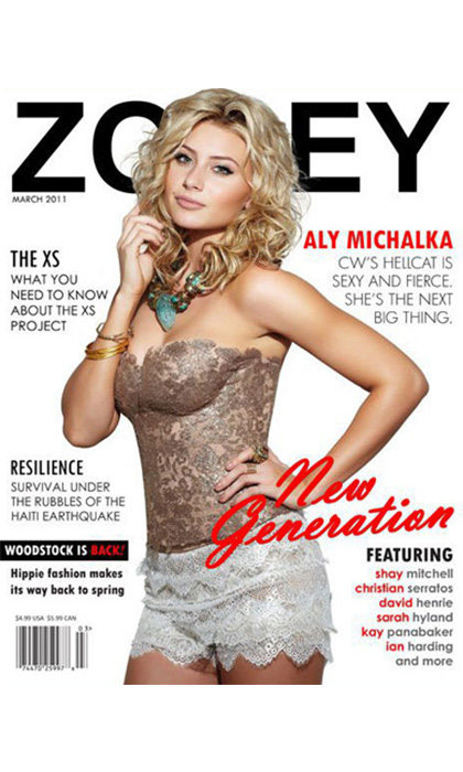 Magazine cover of a woman in a brown corset and white shorts