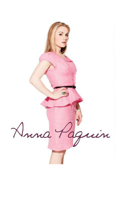 Magazine page of a woman in a pink dress