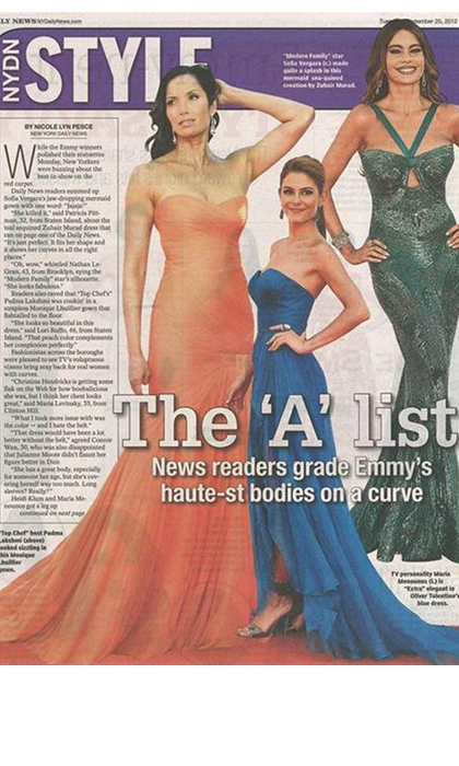 Newspaper page of an article with 3 women in gowns