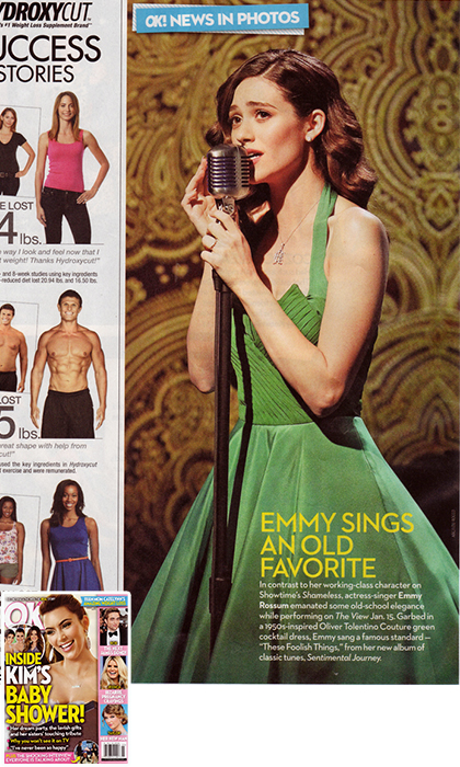 Magazine page with a woman in a green dress singing