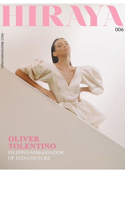Magazine cover of a woman in an off white dress