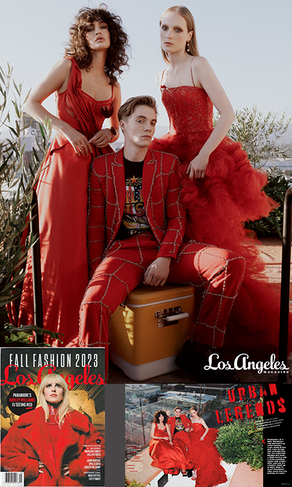 Magazine page of 2 female and 1 male models in red outfits