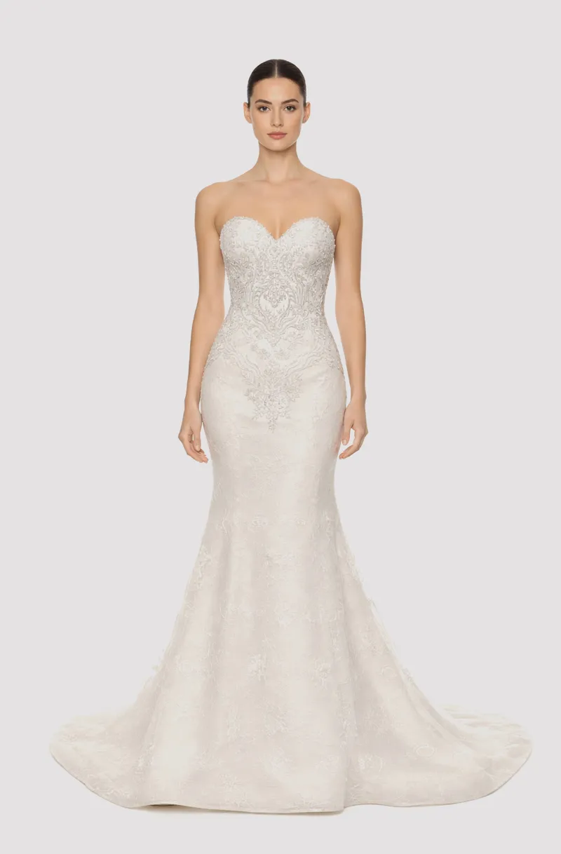 Front view of a woman in an Off-white French lace sweetheart neckline mermaid gown with hand-beaded applique bodice 11, image 1