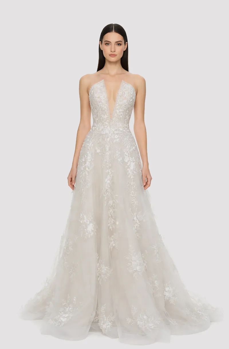 Front view of a woman in an Off-white deep neck tulle ball gown embellished with cascading laces 2, image 1