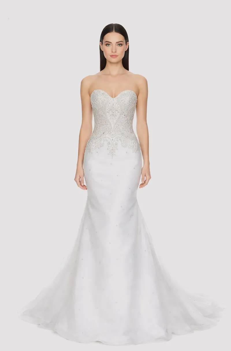 Front view of a woman in an Off-white tulle mermaid gown with silver hand-embroidered, hand-beaded bodice 6, image 1