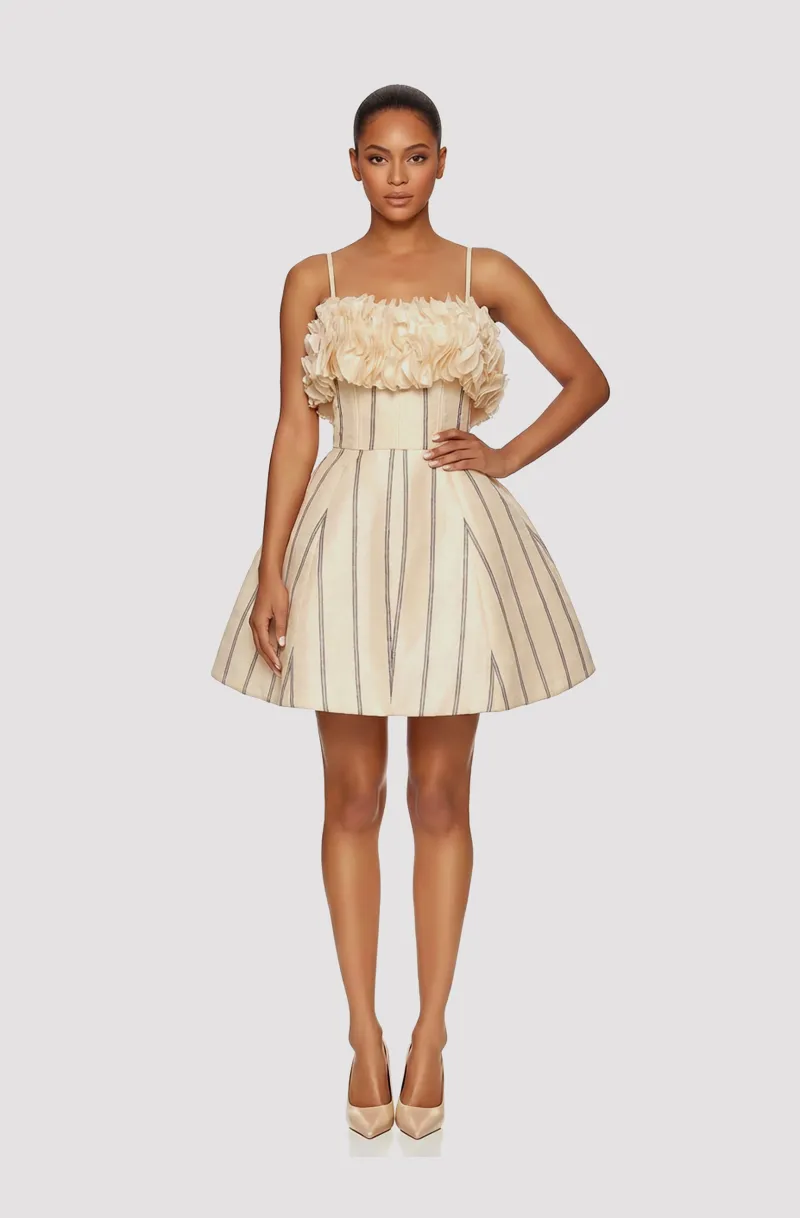 Front view of a woman in an Ivory ECO piña silk structured mini dress featuring woven navy stripes and floral cut-outs on the lapel 11, image 1