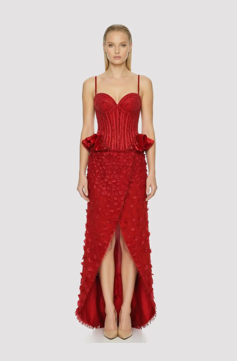 Front view of a woman in a Red ECO hand-beaded piña corset and tulip skirt embellished with pina cut-outs 19, image 1