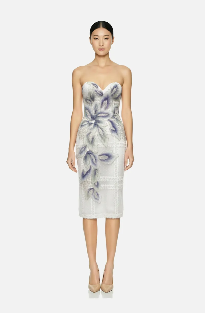 Front view of a woman in an Off-white dotted Swiss tulle corseted sheath dress with off-white strip lace appliqués and mint green, blue and purple beaded floral appliqués 50, image 1