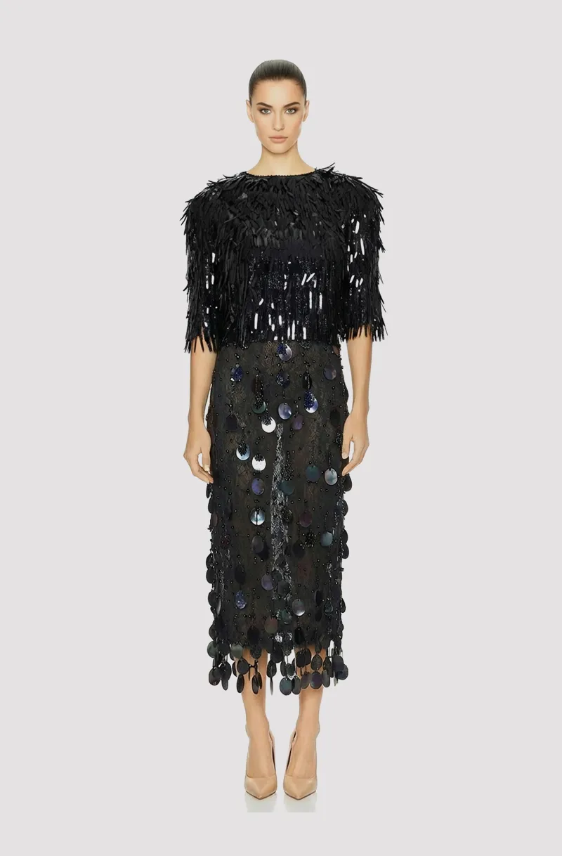 Front view of a woman in a Two-piece black ensemble of beaded midi sheath dress with corseted French lace top and detachable 3/4-sleeve sequined overblouse 72, image 1