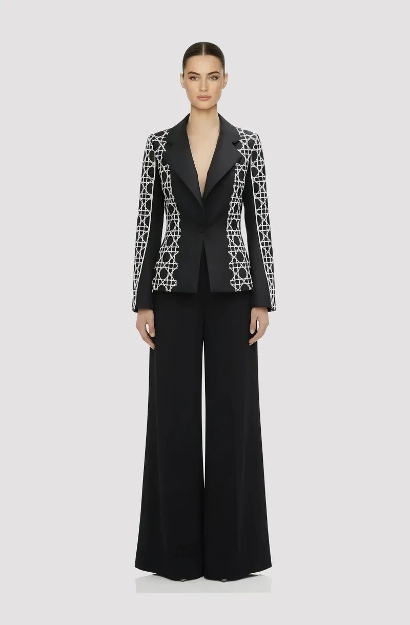 Front view of a woman in a Black & white custom printed mikado jacket with black palazzo pants 73, image 1
