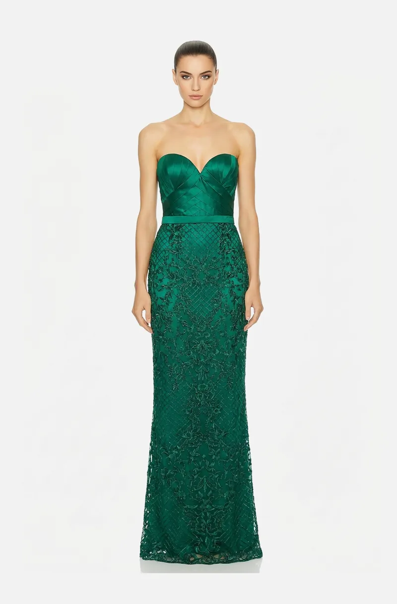 Front view of a woman in an Emerald green mikado strapless gown with draped bodice and embroidered lace skirt 1, image 1
