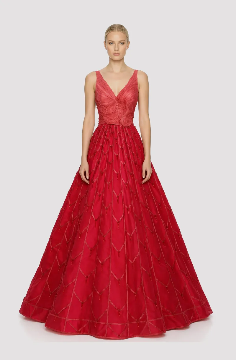 Front view of a woman in a Red silk organza ball gown with abaca fabric hand-draped bodice and skirt embellished with piña strips 19, image 1