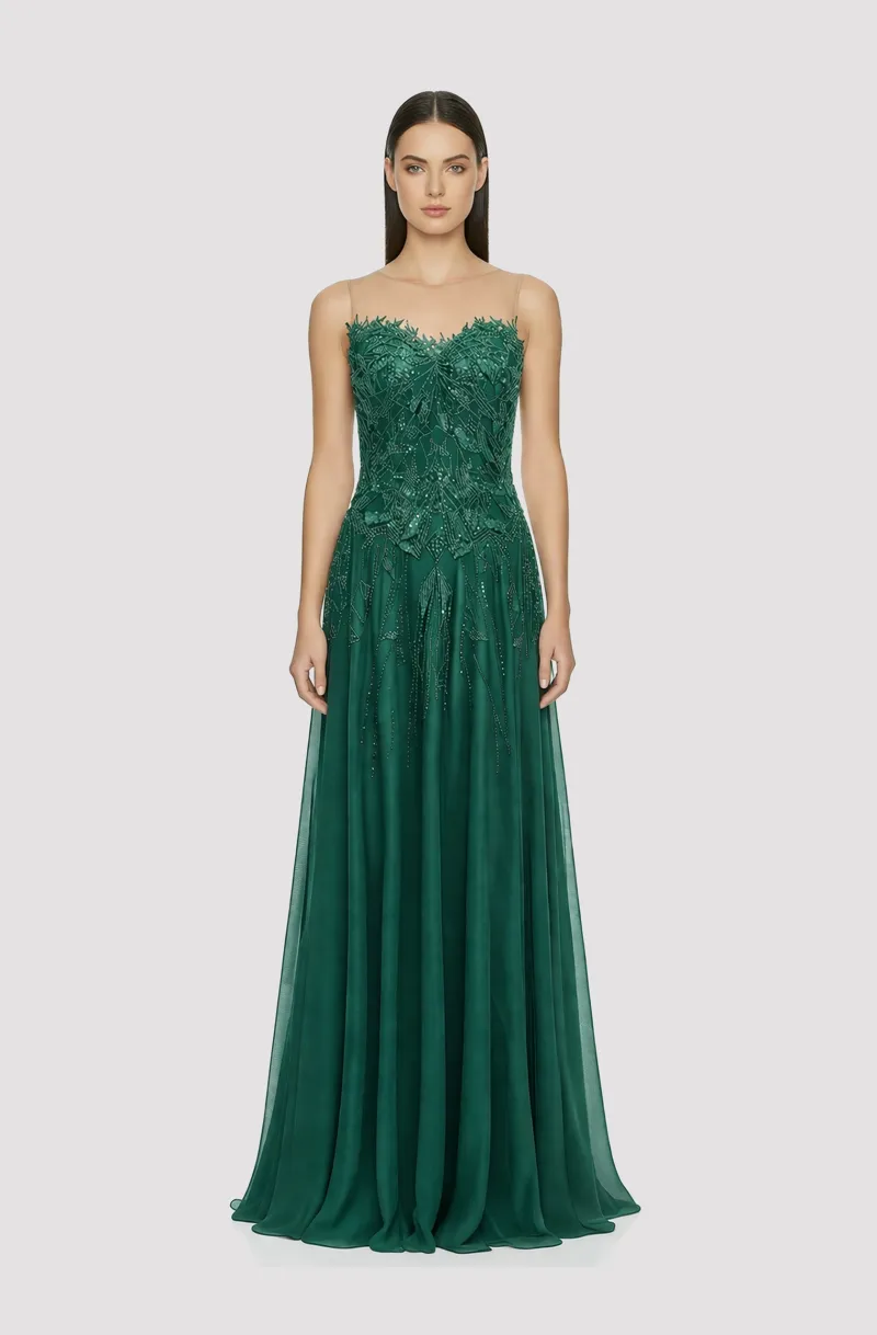 Front view of a woman in an Emerald green silk organza ball gown embellished with art deco style hand-beaded cascading bodice 2, image 1