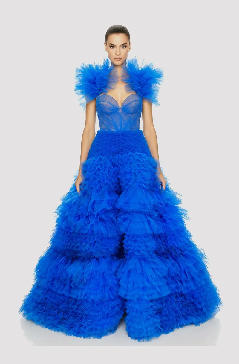 Front view of a woman in a Royal blue tulle couture ball gown with draped bodice and layered ruffled skirt 29, image 1