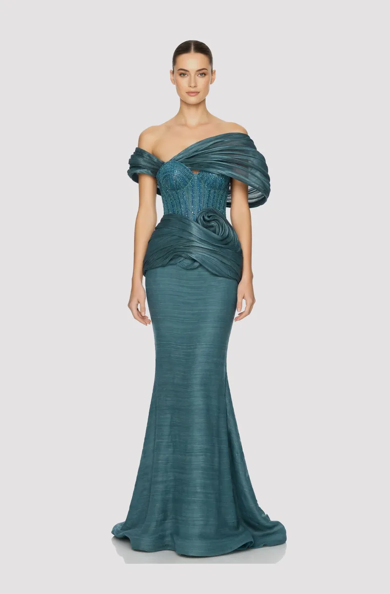 Front view of a woman in a Turquoise ECO piña and abaca fabric gown with hand-beaded corset and abaca fabric off-shoulder draping 32, image 1