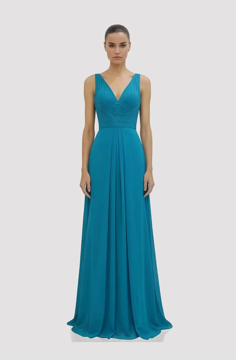 Front view of a woman in a Hand-draped turquoise silk chiffon gown with deep v-neck and twisted shoulder straps 33, image 1